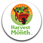 Harvest of the Month Logo featuring a wheelbarrow with a seasons harvest.